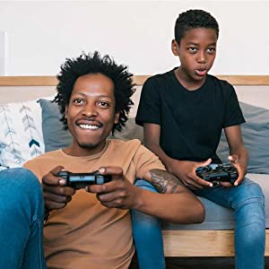 Father and son playing video games