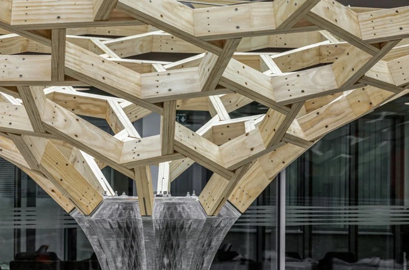 Close-up of the top of the column at the interface of the wooden structure